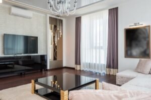 Sleek and stylish modern living room with luxurious furniture and elegant decor.