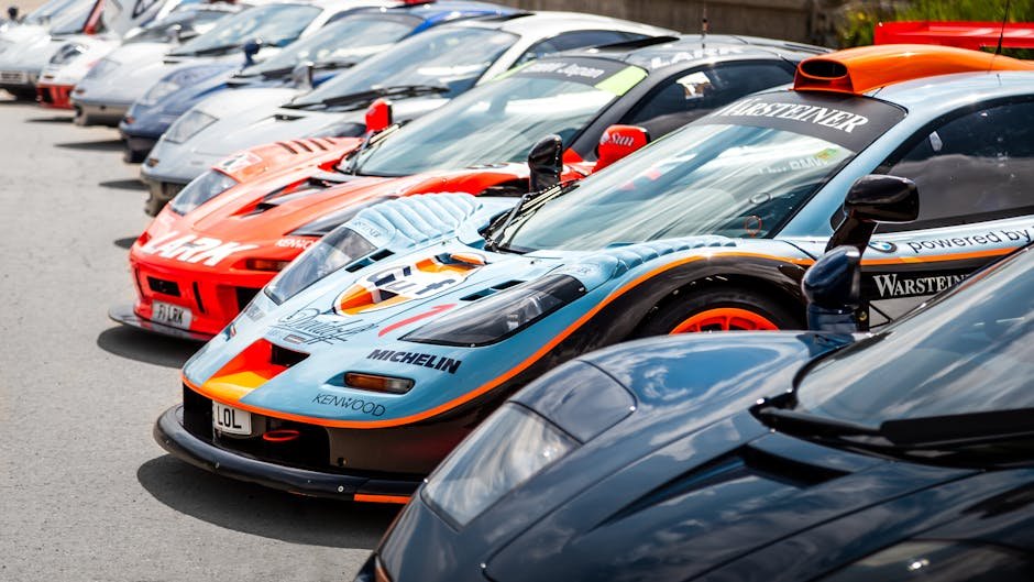 A vibrant lineup of classic and supercars showcasing style and speed, perfect for auto enthusiasts.
